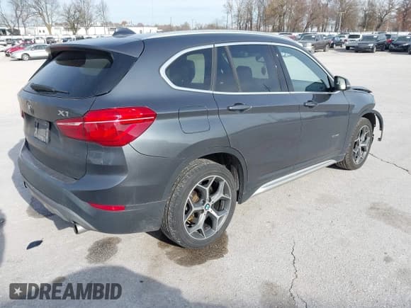 ✅ 2018 BMW X1 xDrive28i • VIN: WBXHT3C32J5K20782 • Lot: 43724861. Listed on IAAI with 223,747 mi. Free auction sales archive from the USA and detailed vehicle history report at DreamBid. Image 4.