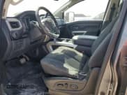 ✅ 2017 Nissan Titan SV • VIN: 1N6AA1F25HN556025 • Лот: 50098995. Опубликован ранее на Copart с пробегом 161 927 миль. Бесплатный доступ к архиву аукционных продаж из США и подробный отчёт об истории автомобиля на DreamBid. Изображение 7.