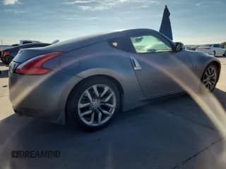 ✅ 2014 Nissan 370Z • VIN: JN1AZ4EH8EM634868 • Lot: 89435935. Wystawiony na Copart z przebiegiem 163 590 mil. Bezpłatny archiwum sprzedaży aukcyjnych z USA i szczegółowy raport historii pojazdu na DreamBid. Zdjęcie 3.