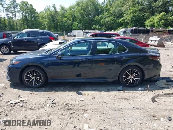 2021 Toyota Camry SE with VIN 4T1G11BK4MU042911, listed as a IAAI auction lot 42495834 with 73,314 mi miles and . Bid and sale history available at DreamBid. Image 14.