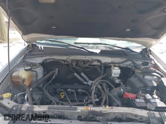 2009 Mercury Mariner Premier with VIN 4M2CU97779KJ00665, listed as a IAAI auction lot 42698060 with 162,205 mi miles and . Bid and sale history available at DreamBid. Image 10.