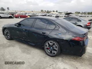 ✅ 2024 BMW i5 M60 • VIN: WBY43FK03RCP92888 • Лот: 76619994. Опубликован ранее на Copart с пробегом 10 829 миль. Бесплатный доступ к архиву аукционных продаж из США и подробный отчёт об истории автомобиля на DreamBid. Изображение 2.