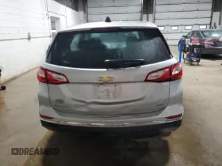 ✅ 2018 Chevrolet Equinox LS • VIN: 2GNAXREV9J6227986 • Lot: 89443525. Wystawiony na Copart z przebiegiem 98 497 mil. Bezpłatny archiwum sprzedaży aukcyjnych z USA i szczegółowy raport historii pojazdu na DreamBid. Zdjęcie 6.
