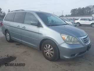 ✅ 2010 Honda Odyssey EX-L • VIN: 5FNRL3H74AB033507 • Lot: 43750910. Listed on IAAI with 153,789 mi. Free auction sales archive from the USA and detailed vehicle history report at DreamBid. Image 1.