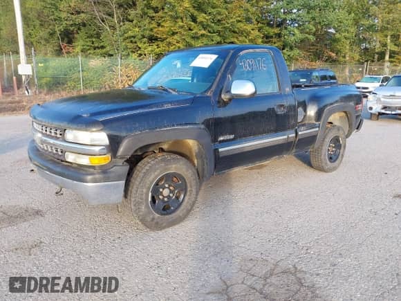 2002 Chevrolet Silverado 1500 LS with VIN 1GCEK14T92Z186601, listed as a IAAI auction lot 43091176 with 110,697 mi miles and . Bid and sale history available at DreamBid. Image 2.