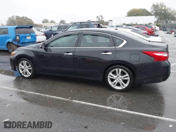✅ 2016 Nissan Altima SL • VIN: 1N4BL3AP2GC291189 • Lot: 43572471. Listed on IAAI with 104,412 mi. Free auction sales archive from the USA and detailed vehicle history report at DreamBid. Image 14.