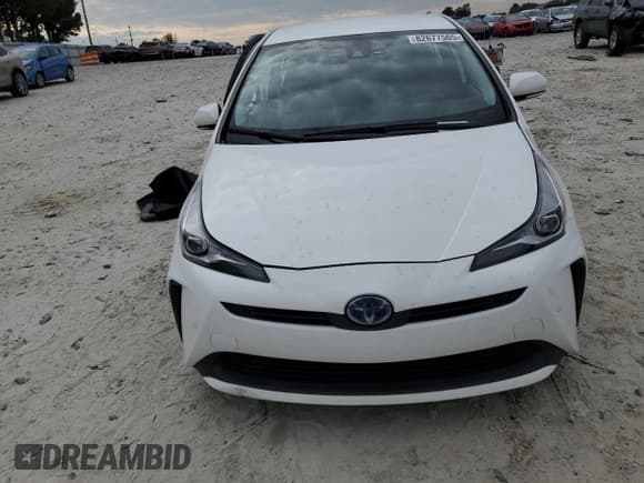 ✅ 2022 Toyota Prius LE • VIN: JTDKAMFU6N3182140 • Lot: 82677565. Wystawiony na Copart z przebiegiem 79 813 mil. Bezpłatny archiwum sprzedaży aukcyjnych z USA i szczegółowy raport historii pojazdu na DreamBid. Zdjęcie 5.