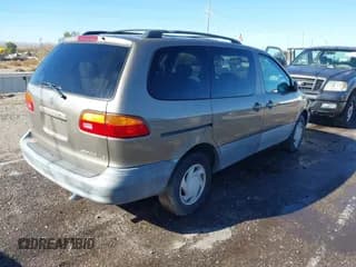 ✅ 1999 Toyota Sienna LE • VIN: 4T3ZF13C5XU149740 • Lot: 43611197. Listed on IAAI with 203,045 mi. Free auction sales archive from the USA and detailed vehicle history report at DreamBid. Image 4.