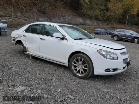 2011 Chevrolet Malibu LTZ с VIN 1G1ZE5E15BF380954, выставлен на аукционе Copart как лот 90543375 с пробегом 238 172 миль миль и Списание • Salvage title. История ставок и продаж доступна на DreamBid. Изображение 4.