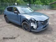 ✅ 2023 Mazda CX-5 S Carbon Edition • VIN: JM3KFBCM8P0223695 • Lot: 42379352. Listed on IAAI with 41,849 mi. Free auction sales archive from the USA and detailed vehicle history report at DreamBid. Image 1.