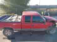 1997 Chevrolet Silverado 1500 z VIN 2GCEK19R5V1290268, wystawiony jako IAAI lot #43485965 z przebiegiem 192 915 mil mil oraz . Historia ofert i sprzedaży dostępna na DreamBid. Obrazek 13.