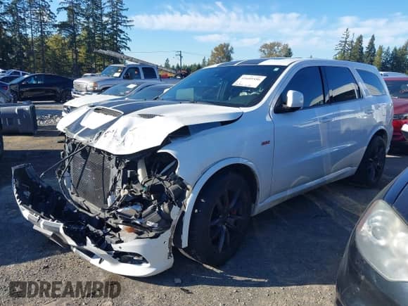 2018 Dodge Durango SRT with VIN 1C4SDJGJ3JC395759, listed as a IAAI auction lot 41689356 with 83,577 mi miles and . Bid and sale history available at DreamBid. Image 2.