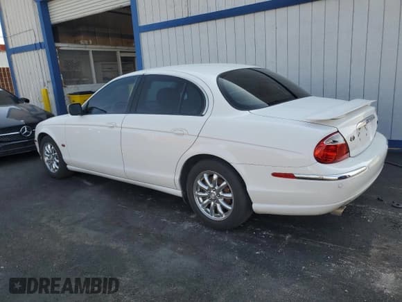 ✅ 2002 Jaguar S-Type • VIN: SAJDA01P92GM29630 • Лот: 62421225. Опубликован ранее на Copart с пробегом 75 686 миль. Бесплатный доступ к архиву аукционных продаж из США и подробный отчёт об истории автомобиля на DreamBid. Изображение 2.