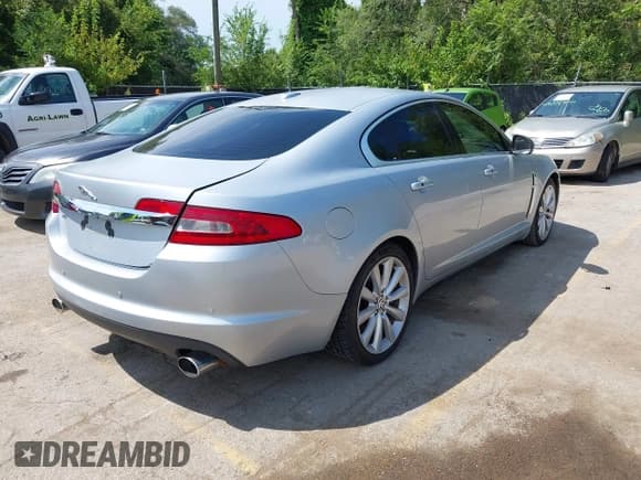 ✅ 2010 Jaguar XF Premium Luxury • VIN: SAJWA0GB7ALR54597 • Lot: 43030809. Listed on IAAI with 127,917 mi. Free auction sales archive from the USA and detailed vehicle history report at DreamBid. Image 4.