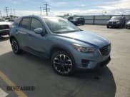 ✅ 2016 Mazda CX-5 Grand Touring • VIN: JM3KE4DY9G0612426 • Lot: 82179145. Wystawiony na Copart z przebiegiem 147 130 mil. Bezpłatny archiwum sprzedaży aukcyjnych z USA i szczegółowy raport historii pojazdu na DreamBid. Zdjęcie 14.