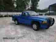 1999 Dodge Dakota SLT z VIN 1B7FL26X0XS298131, wystawiony jako Copart lot #69590254 z przebiegiem 162 606 mil mil oraz Szkoda całkowita • Salvage title. Historia ofert i sprzedaży dostępna na DreamBid. Obrazek 11.