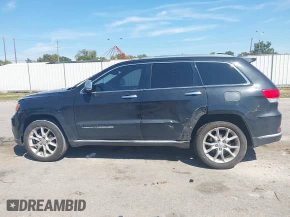 ✅ 2015 Jeep Grand Cherokee Summit • VIN: 1C4RJEJG2FC848708 • Lot: 43331634. Listed on IAAI with 175,969 mi. Free auction sales archive from the USA and detailed vehicle history report at DreamBid. Image 14.