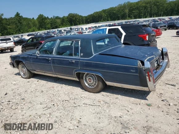 ✅ 1988 Cadillac Brougham • VIN: 1G6DW51Y3JR758531 • Lot: 65984095. Listed on Copart with 75,087 mi. Free auction sales archive from the USA and detailed vehicle history report at DreamBid. Image 2.
