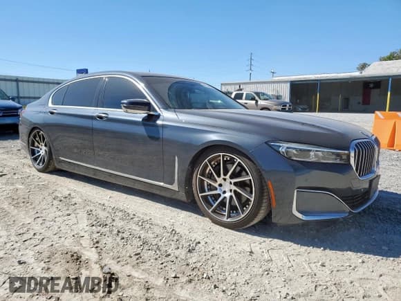 ✅ 2020 BMW 7 Series 740i • VIN: WBA7T2C00LCE43524 • Лот: 90944855. Опубликован ранее на Copart с пробегом 99 849 миль. Бесплатный доступ к архиву аукционных продаж из США и подробный отчёт об истории автомобиля на DreamBid. Изображение 4.