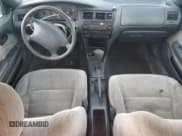 ✅ 1995 Toyota Corolla DX • VIN: 2T1AE09B3SC126047 • Лот: 75198004. Опубликован ранее на Copart с пробегом 220 039 миль. Бесплатный доступ к архиву аукционных продаж из США и подробный отчёт об истории автомобиля на DreamBid. Изображение 8.