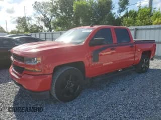 ✅ 2018 Chevrolet Silverado 1500 Custom • VIN: 3GCPCPEC9JG229534 • Лот: 69736195. Опубликован ранее на Copart с пробегом 165 976 миль. Бесплатный доступ к архиву аукционных продаж из США и подробный отчёт об истории автомобиля на DreamBid. Изображение 1.