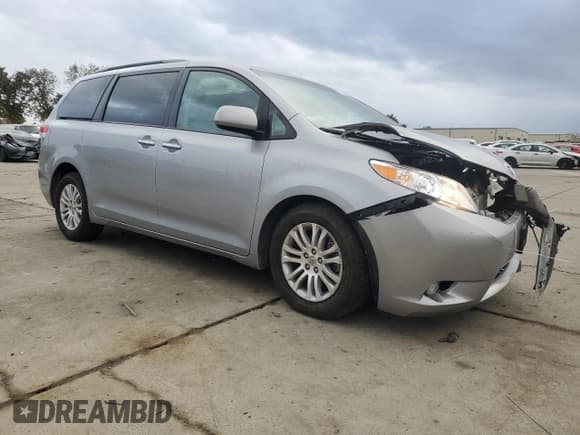 ✅ 2014 Toyota Sienna XLE • VIN: 5TDYK3DCXES406553 • Lot: 91645545. Listed on Copart with 45,437 mi. Free auction sales archive from the USA and detailed vehicle history report at DreamBid. Image 4.