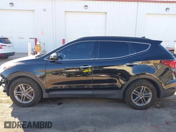 ✅ 2017 Hyundai Santa Fe 2.4L • VIN: 5XYZUDLB4HG448733 • Lot: 43522113. Listed on IAAI with 156,802 mi. Free auction sales archive from the USA and detailed vehicle history report at DreamBid. Image 15.