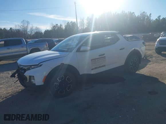 2022 Hyundai Santa Cruz SEL с VIN 5NTJBDAE0NH031390, выставлен на аукционе IAAI как лот 41352458 с пробегом 72 496 миль миль и . История ставок и продаж доступна на DreamBid. Изображение 2.