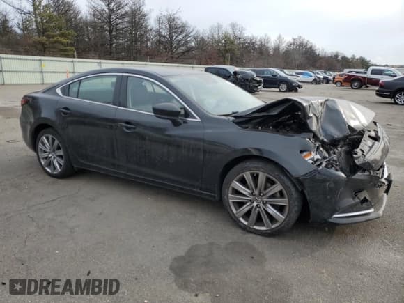 ✅ 2019 Mazda 6 Grand Touring Reserve • VIN: JM1GL1WY1K1503039 • Лот: 87935135. Опубликован ранее на Copart с пробегом 45 645 миль. Бесплатный доступ к архиву аукционных продаж из США и подробный отчёт об истории автомобиля на DreamBid. Изображение 4.