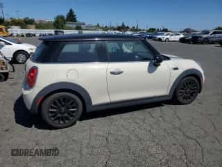 2019 MINI Hardtop Cooper with VIN WMWXP5C52K2H29767, listed as a Copart auction lot 61006445 with 50,212 mi miles and Salvage title. Bid and sale history available at DreamBid. Image 3.