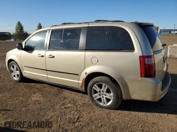 ✅ 2010 Dodge Grand Caravan SE • VIN: 2D4RN4DE8AR255706 • Лот: 82090695. Опубликован ранее на Copart с пробегом 287 251 миль. Бесплатный доступ к архиву аукционных продаж из США и подробный отчёт об истории автомобиля на DreamBid. Изображение 2.