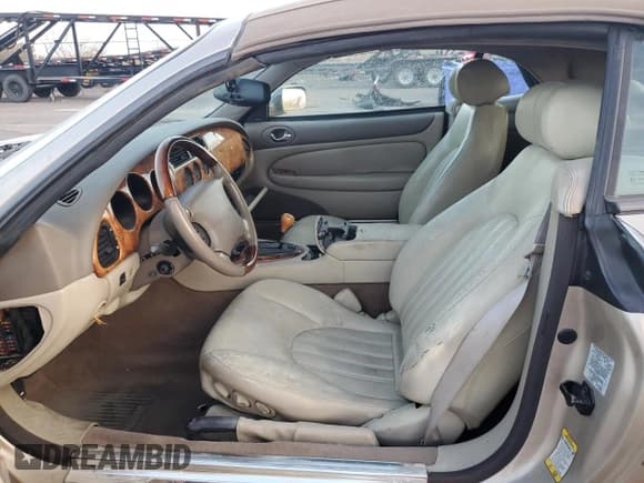 ✅ 2002 Jaguar XK • VIN: SAJDA42C12NA24962 • Lot: 42982755. Wystawiony na Copart z przebiegiem 125 097 mil. Bezpłatny archiwum sprzedaży aukcyjnych z USA i szczegółowy raport historii pojazdu na DreamBid. Zdjęcie 7.