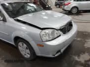 ✅ 2006 Suzuki Forenza • VIN: KL5JD86Z96K347066 • Lot: 43031924. Listed on IAAI with 65,393 mi. Free auction sales archive from the USA and detailed vehicle history report at DreamBid. Image 19.