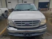 ✅ 2000 Ford F-150 XL • VIN: 1FTZF1722YNA14211 • Lot: 96284635. Wystawiony na Copart z przebiegiem 145 604 mil. Bezpłatny archiwum sprzedaży aukcyjnych z USA i szczegółowy raport historii pojazdu na DreamBid. Zdjęcie 5.