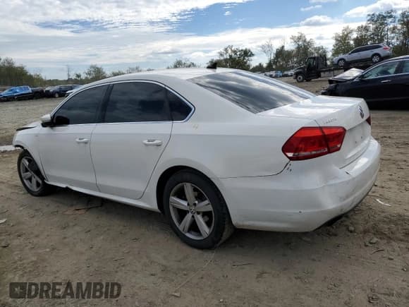 ✅ 2014 Volkswagen Passat S • VIN: 1VWAT7A35EC021328 • Lot: 86858725. Listed on Copart with 148,500 mi. Free auction sales archive from the USA and detailed vehicle history report at DreamBid. Image 2.