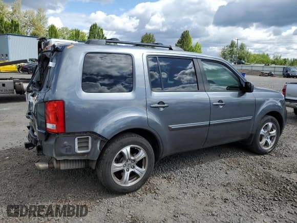 ✅ 2013 Honda Pilot EX-L • VIN: 5FNYF4H77DB035961 • Lot: 57903095. Listed on Copart with 193,387 mi. Free auction sales archive from the USA and detailed vehicle history report at DreamBid. Image 3.