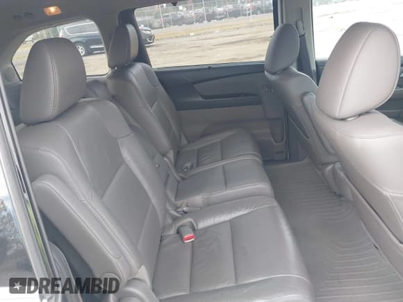 ✅ 2012 Honda Odyssey Touring • VIN: 5FNRL5H9XCB126080 • Lot: 43686755. Listed on IAAI with 116,383 mi. Free auction sales archive from the USA and detailed vehicle history report at DreamBid. Image 8.