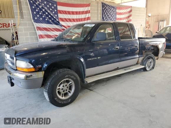 2000 Dodge Dakota Sport with VIN 1B7GG2AN8YS722350, listed as a Copart auction lot 69377984 with 199,883 mi miles and Salvage title. Bid and sale history available at DreamBid. Image 1.