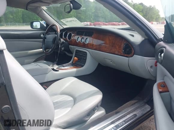 ✅ 2003 Jaguar XK • VIN: SAJDA42C732A35547 • Lot: 42090286. Listed on IAAI with 65,840 mi. Free auction sales archive from the USA and detailed vehicle history report at DreamBid. Image 5.