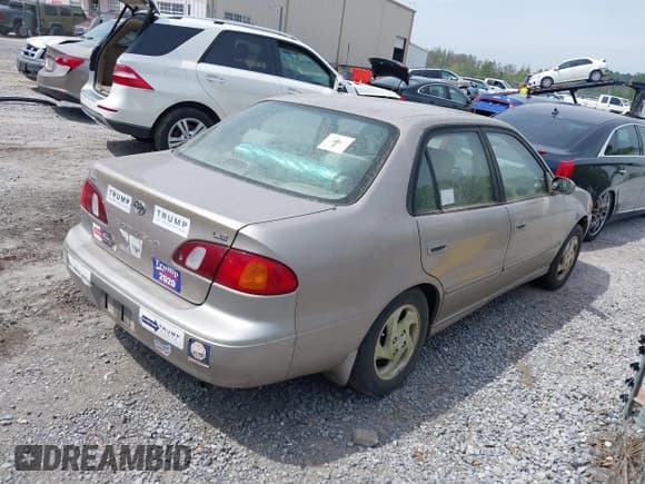 ✅ 2000 Toyota Corolla VE • VIN: 2T1BR12E2YC319804 • Lot: 41895787. Listed on IAAI with 160,985 mi. Free auction sales archive from the USA and detailed vehicle history report at DreamBid. Image 4.