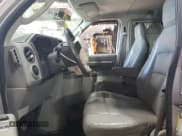 ✅ 2014 Ford Econoline Passenger XL • VIN: 1FBNE3BL0EDA45637 • Лот: 66751585. Опубликован ранее на Copart с пробегом 132 326 миль. Бесплатный доступ к архиву аукционных продаж из США и подробный отчёт об истории автомобиля на DreamBid. Изображение 7.