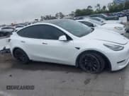 ✅ 2023 Tesla Model Y Long Range • VIN: 7SAYGDEE3PA055497 • Lot: 42396529. Listed on IAAI with 18,230 mi. Free auction sales archive from the USA and detailed vehicle history report at DreamBid. Image 12.