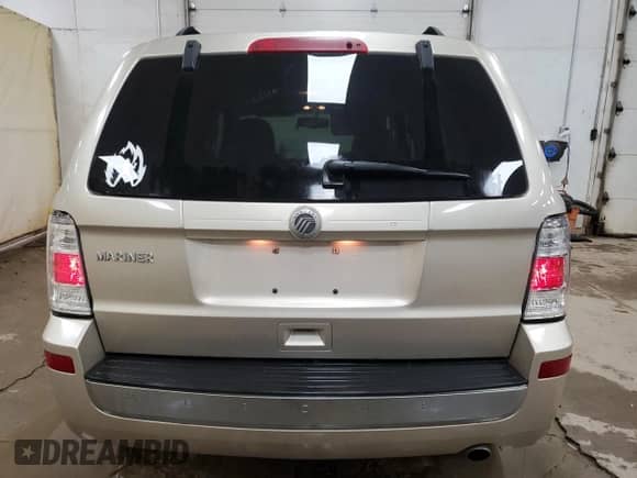 2011 Mercury Mariner z VIN 4M2CN8B78BKJ06091, wystawiony jako Copart lot #55331835 z przebiegiem 167 484 mil mil oraz Czysty tytuł • Clean title. Historia ofert i sprzedaży dostępna na DreamBid. Obrazek 6.