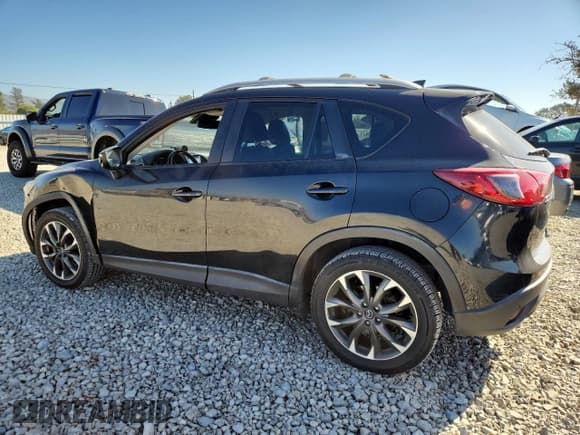 ✅ 2016 Mazda CX-5 Grand Touring • VIN: JM3KE2DY2G0792854 • Lot: 90675065. Wystawiony na Copart z przebiegiem 134 490 mil. Bezpłatny archiwum sprzedaży aukcyjnych z USA i szczegółowy raport historii pojazdu na DreamBid. Zdjęcie 2.