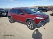 ✅ 2015 Jeep Cherokee Trailhawk • VIN: 1C4PJMBS8FW549081 • Lot: 92130325. Listed on Copart with 157,279 mi. Free auction sales archive from the USA and detailed vehicle history report at DreamBid. Image 4.