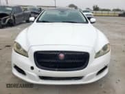 ✅ 2014 Jaguar XJ Portfolio • VIN: SAJWA2GZ0E8V59176 • Lot: 71057635. Listed on Copart with 111,064 mi. Free auction sales archive from the USA and detailed vehicle history report at DreamBid. Image 5.