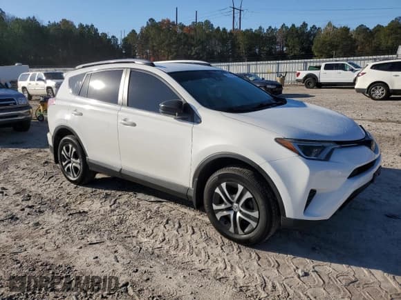 ✅ 2018 Toyota RAV4 LE • VIN: JTMBFREV5JJ727484 • Lot: 92727435. Listed on Copart with 106,604 mi. Free auction sales archive from the USA and detailed vehicle history report at DreamBid. Image 4.