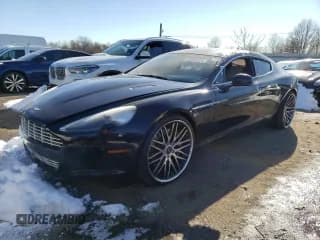 ✅ 2011 Aston Martin Rapide • VIN: SCFHDDAJ1BAF01440 • Lot: 40741124. Wystawiony na Copart z przebiegiem Nie podano. Bezpłatny archiwum sprzedaży aukcyjnych z USA i szczegółowy raport historii pojazdu na DreamBid. Zdjęcie 1.