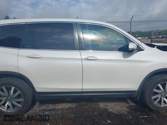 ✅ 2019 Honda Pilot EX-L • VIN: 5FNYF5H54KB001588 • Lot: 42472595. Listed on IAAI with 150,254 mi. Free auction sales archive from the USA and detailed vehicle history report at DreamBid. Image 14.