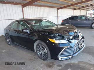 ✅ 2023 Toyota Camry Hybrid XLE • VIN: 4T1F31AK6PU054070 • Lot: 42499909. Wystawiony na IAAI z przebiegiem 31 713 mil. Bezpłatny archiwum sprzedaży aukcyjnych z USA i szczegółowy raport historii pojazdu na DreamBid. Zdjęcie 1.